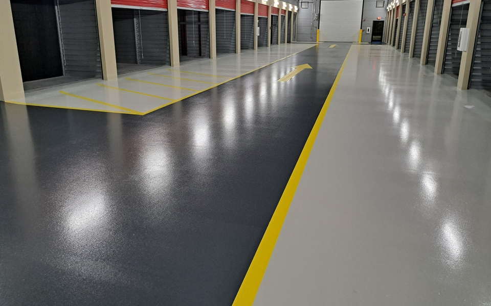 Modern storage facility featuring premium epoxy flooring that enhances the customer experience