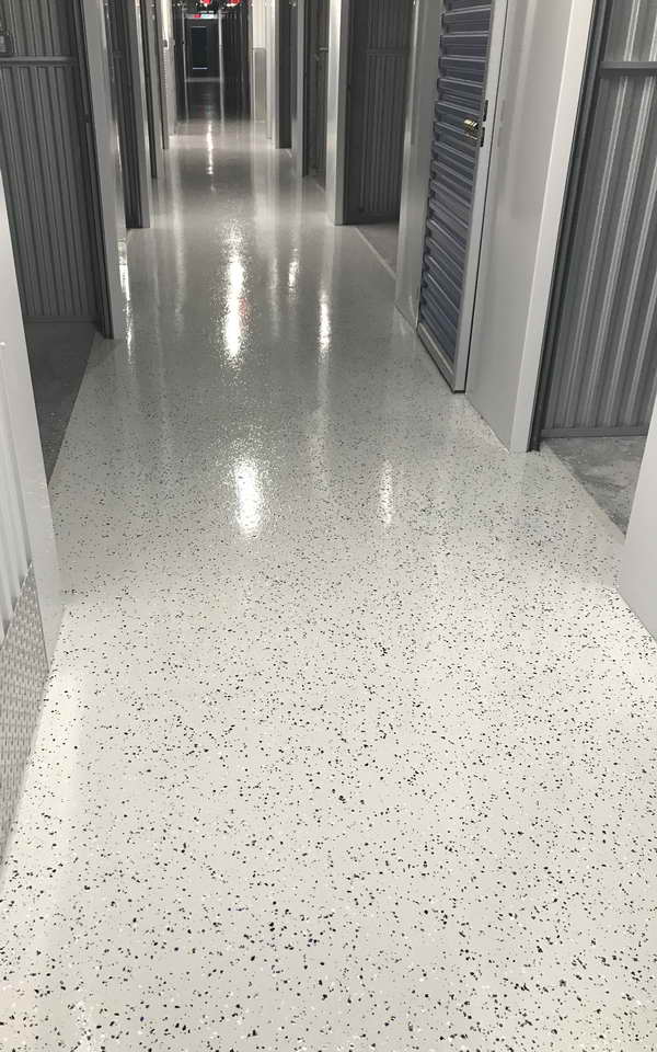 Designer epoxy flooring installation showcasing premium finishes that enhance customer experience